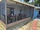 Enclosed patio area offers plenty of room to relax and entertain at 225 W Orange St, Lake Alfred, FL 33850