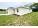 View of the home's backyard and home exterior at 2521 Sunset Dr, Winter Haven, FL 33881