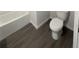 Bathroom featuring a toilet and modern floors at 2521 Sunset Dr, Winter Haven, FL 33881