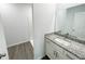 Bathroom featuring a granite countertop, sink, and a view of the shower stall at 2521 Sunset Dr, Winter Haven, FL 33881