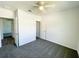 Bedroom featuring multiple doorways and closet at 2521 Sunset Dr, Winter Haven, FL 33881