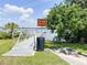 Public dock for Lake Conine with accessibility ramp and lush greenery at 2521 Sunset Dr, Winter Haven, FL 33881