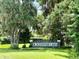 Community entrance sign for Blackwater Oaks surrounded by lush landscaping at 2932 Blackwater Oaks Dr, Mulberry, FL 33860