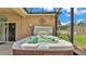 Outdoor hot tub perfect for relaxation with a beautiful outdoor view at 2932 Blackwater Oaks Dr, Mulberry, FL 33860