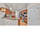 Well-equipped kitchen featuring wood cabinetry, granite countertops, and stainless steel appliances at 2932 Blackwater Oaks Dr, Mulberry, FL 33860