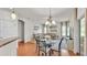 Inviting living area with neutral paint, modern lighting and an open floorplan at 2932 Blackwater Oaks Dr, Mulberry, FL 33860