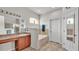The main bathroom features a separate soaking tub, vanity with generous counter space, and a tiled shower at 2932 Blackwater Oaks Dr, Mulberry, FL 33860