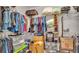 The walk-in closet offers ample storage space with shelving and hanging rods, perfect for organization at 2932 Blackwater Oaks Dr, Mulberry, FL 33860