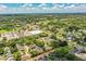 Expansive aerial view showcasing the neighborhood's proximity to parks and roadways at 3542 Raintree Ct, Lakeland, FL 33803