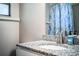 Bathroom featuring a granite countertop, modern faucet, and neutral wall paint at 3542 Raintree Ct, Lakeland, FL 33803