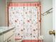 Bathroom with decorative butterfly curtain, adding a whimsical touch at 3542 Raintree Ct, Lakeland, FL 33803
