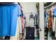 Walk-in closet with clothing racks, a suitcase, and other personal items at 3542 Raintree Ct, Lakeland, FL 33803