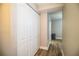 Hallway featuring closet and hardwood floors at 3542 Raintree Ct, Lakeland, FL 33803