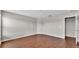 Bright bedroom with hardwood floors, a large window, and neutral walls, creating a serene atmosphere at 4143 Red Fern Ln, Lakeland, FL 33811