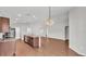 Open kitchen featuring a granite island and stainless appliances at 4143 Red Fern Ln, Lakeland, FL 33811