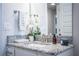 Bright bathroom featuring granite countertops, a modern faucet, and tasteful decor at 4222 Juliana Lake Dr, Auburndale, FL 33823