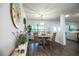 Inviting dining area featuring wood floors, natural light, and decorative accents at 4222 Juliana Lake Dr, Auburndale, FL 33823