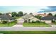 Charming single-story home featuring a well-manicured lawn and a neatly paved driveway at 4222 Juliana Lake Dr, Auburndale, FL 33823