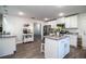 Spacious kitchen with stainless steel appliances, granite countertops and an island at 4222 Juliana Lake Dr, Auburndale, FL 33823