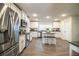 Modern kitchen with stainless steel appliances, a center island, and white cabinets at 4222 Juliana Lake Dr, Auburndale, FL 33823
