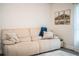 Cozy living room featuring a plush sofa and tasteful wall art at 4222 Juliana Lake Dr, Auburndale, FL 33823