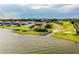 Waterfront property featuring a private dock and lakeside access with a residential home at 4222 Juliana Lake Dr, Auburndale, FL 33823