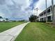 Scenic view of the golf course with mature landscaping and inviting walkways at 443 Enclave Pl # 0, Lakeland, FL 33803