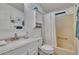 Cozy bathroom features a shower and tub combination with a vanity at 451 Village Sw Cir, Winter Haven, FL 33880