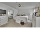 Bedroom with queen size bed, closet and ceiling fan at 451 Village Sw Cir, Winter Haven, FL 33880