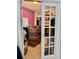 Office featuring french doors and plenty of boxes for moving at 4665 Sw 40Th Pl, Ocala, FL 34474