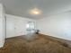 An empty bedroom with glass door access to the outside at 4720 Wildflower Dr Dr, Lakeland, FL 33811