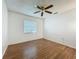 Bedroom with wood floor and ceiling fan at 4720 Wildflower Dr Dr, Lakeland, FL 33811