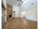 Open layout with tile floors and a beautiful stone fireplace at 4720 Wildflower Dr Dr, Lakeland, FL 33811