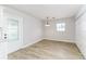 Light-filled dining room features new hardwood floors and neutral paint; move-in ready! at 508 Boger N Blvd, Lakeland, FL 33803
