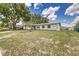 Residential home featuring a well-kept lawn, providing a serene and welcoming atmosphere at 508 Boger N Blvd, Lakeland, FL 33803