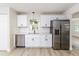 Modern kitchen with stainless steel appliances, quartz countertops, and bright white cabinetry at 508 Boger N Blvd, Lakeland, FL 33803
