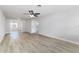 Spacious living room features new floors, fresh paint, a ceiling fan, and great natural light at 508 Boger N Blvd, Lakeland, FL 33803