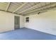 Enclosed patio showcasing a painted floor, textured block walls, and exterior lighting for comfort at 508 Boger N Blvd, Lakeland, FL 33803
