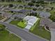 Aerial view of the home and patterned driveway at 5771 Macaw Pl, Lakeland, FL 33809
