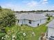 Back exterior view of house highlighting back patio at 5771 Macaw Pl, Lakeland, FL 33809