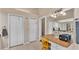 Bathroom that includes dual closets and a vanity with storage for organization and convenience at 5819 Hollyhock Dr, Lakeland, FL 33813