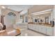 Bathroom with dual sinks, tub and a large window at 5819 Hollyhock Dr, Lakeland, FL 33813