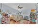 Bright bedroom featuring pops of color, ample storage, and space for study at 5819 Hollyhock Dr, Lakeland, FL 33813