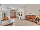 Open foyer showcasing a piano and seating area by the front door at 5819 Hollyhock Dr, Lakeland, FL 33813