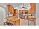 Bright kitchen with wood cabinets, stainless steel appliances, and granite countertops at 5819 Hollyhock Dr, Lakeland, FL 33813