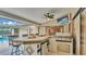 Outdoor kitchen with built-in grill, bar and counter space, perfect for entertaining at 5819 Hollyhock Dr, Lakeland, FL 33813