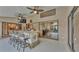 Backyard patio featuring a bar, mounted TV and a view into the backyard pool at 5819 Hollyhock Dr, Lakeland, FL 33813