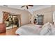 Bright main bedroom with access to the outdoor grill and covered outdoor living space at 5819 Hollyhock Dr, Lakeland, FL 33813