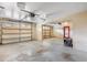 Spacious three-car garage with overhead doors, ample space, and access to the house at 6033 Mountain Lake Dr, Lakeland, FL 33813