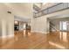 Open-concept living space featuring hardwood floors, high ceilings, and ample natural light at 6033 Mountain Lake Dr, Lakeland, FL 33813